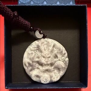 Intricate Jade Dragon Pendant with Cord